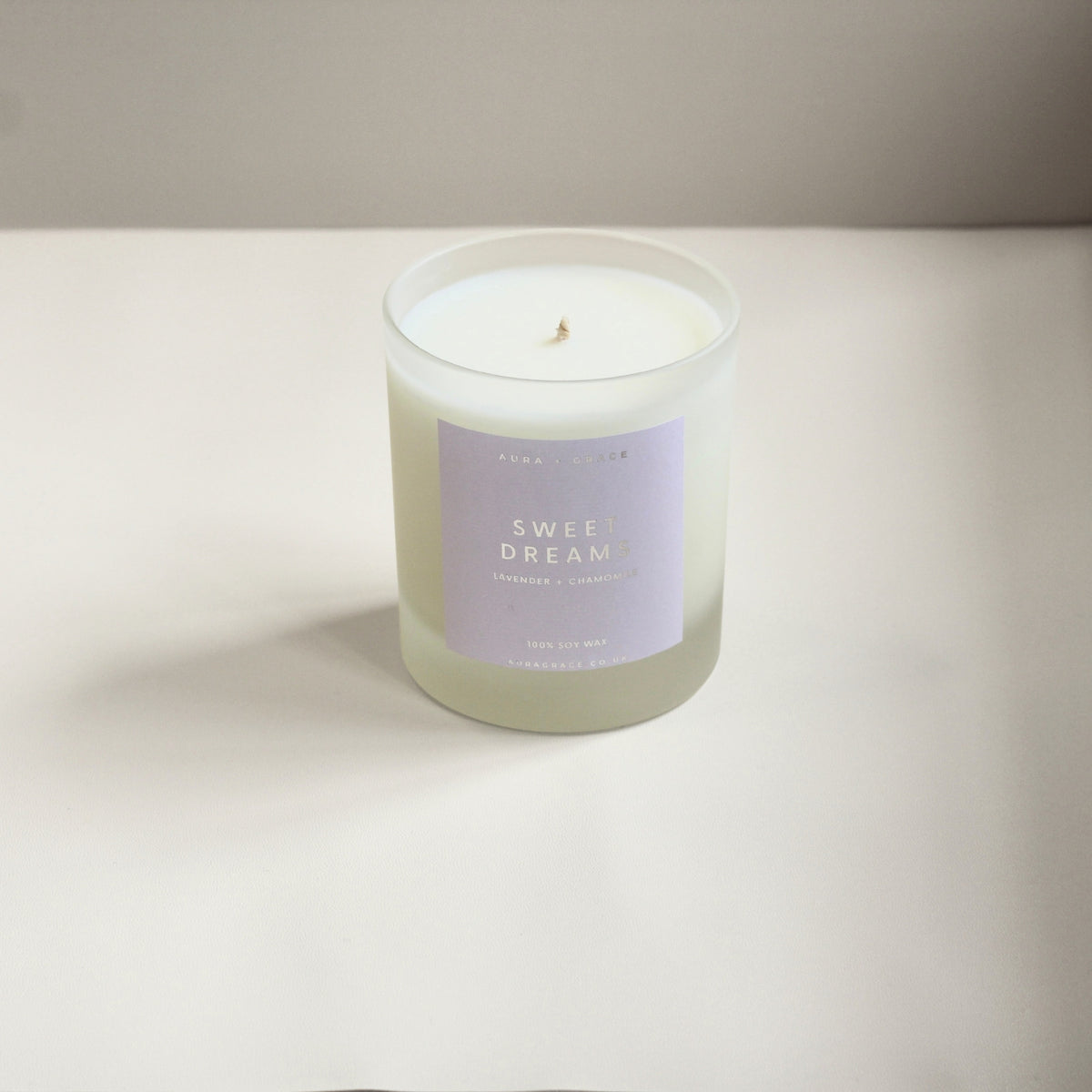 Hand-poured Sweet Dreams soy candle with lavender and chamomile fragrance
