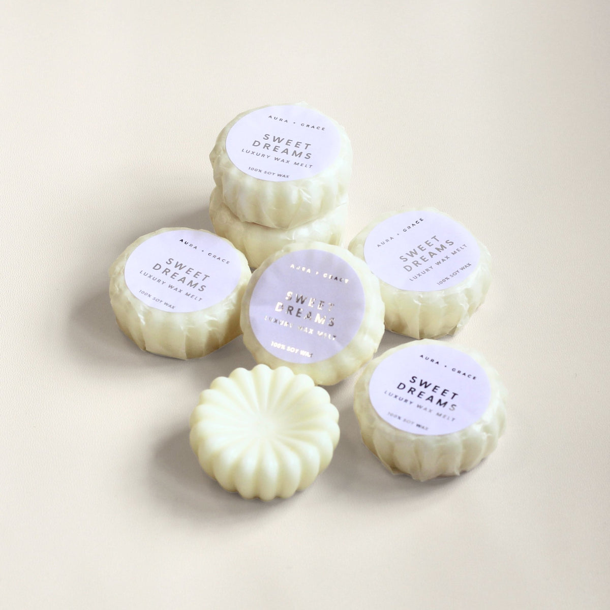 Hand-poured Sweet Dreams scented wax melts in luxury packaging