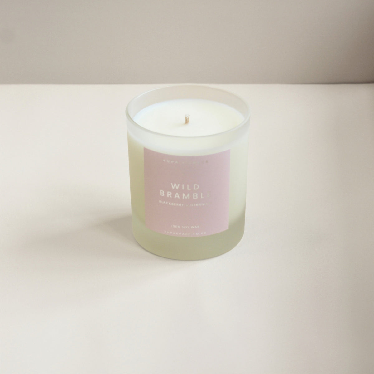 Hand-poured Wild Bramble soy candle with blackberry and geranium fragrance