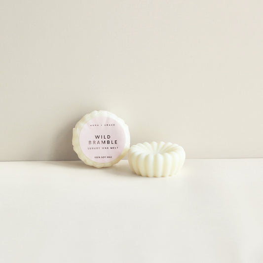 Wild Bramble soy wax melts showing wrapped and unwrapped melt by Aura + Grace